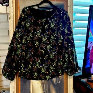 One of my favorite blouses size Large with flowers on it